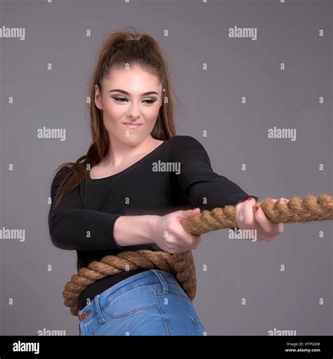 Girl Pulling Rope Stock Photos, Images & Pictures